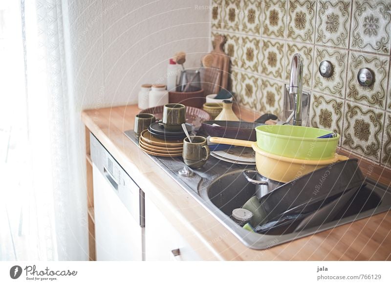 dish washing Crockery Living or residing Flat (apartment) Interior design Furniture Kitchen Kitchen sink Threat Rinse Do the dishes Dirty Many Colour photo