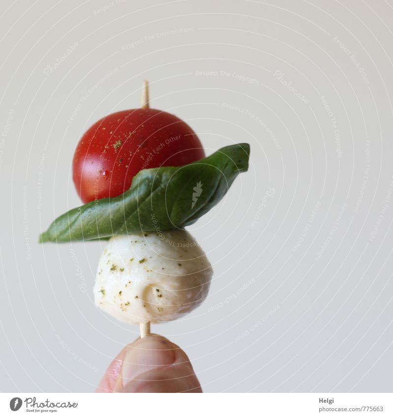 finger-food Food Cheese Fruit Herbs and spices Tomato Basil Nutrition Picnic Organic produce Vegetarian diet Finger food Human being Fingers Impaled Eating