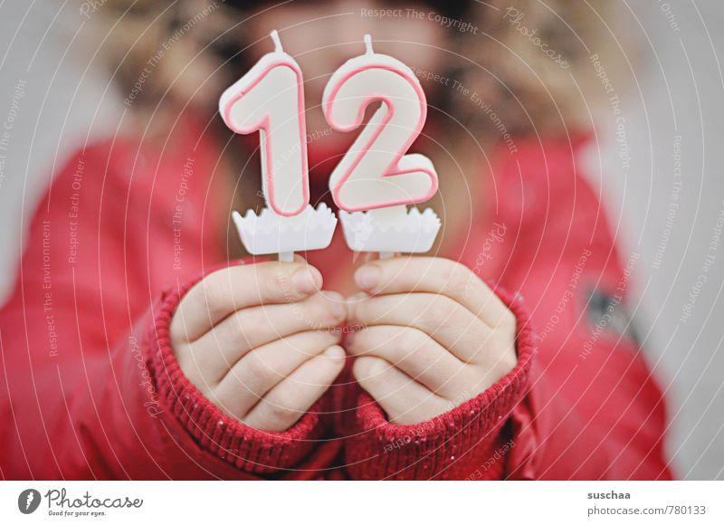 in 12 .. Feminine Child Girl Boy (child) Infancy Body Hand Fingers Human being 8 - 13 years Digits and numbers Red Birthday Jubilee Anticipation Candle Wax