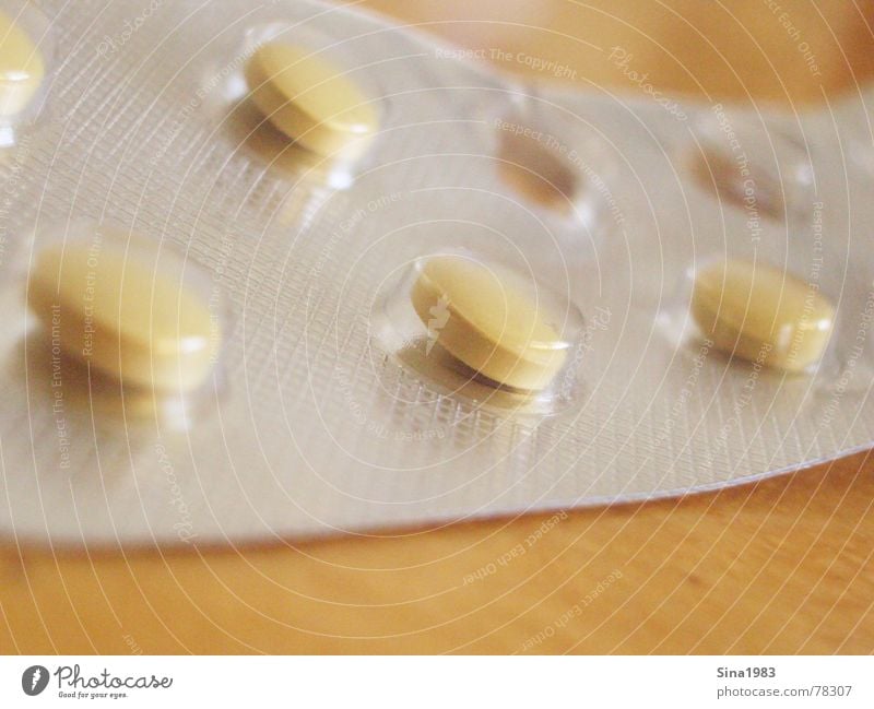 Addicted? Medication Pill Yellow Packing material Pharmacy Table Interior shot Dependence Multicoloured Detail Close-up