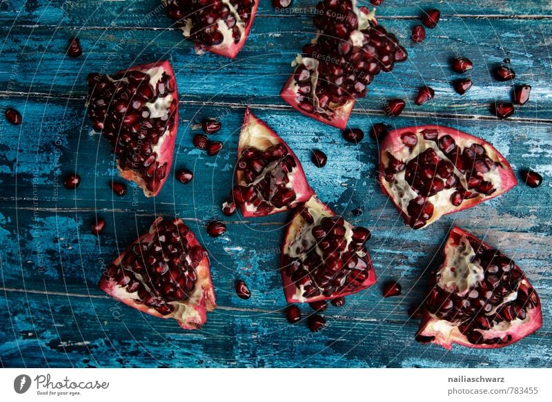 pomegranates Fruit Organic produce Vegetarian diet Diet Plate Wood Delicious Natural Juicy Beautiful Blue Red Energy Colour Pomegranate pomegranate seeds