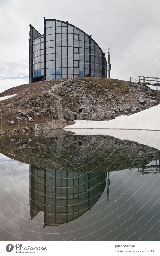 mirroring Architecture Landscape Water Clouds Spring Snow Mountain Lakeside Pond leysin Revolving restaurant Modern architecture Facade Window Hiking Esthetic