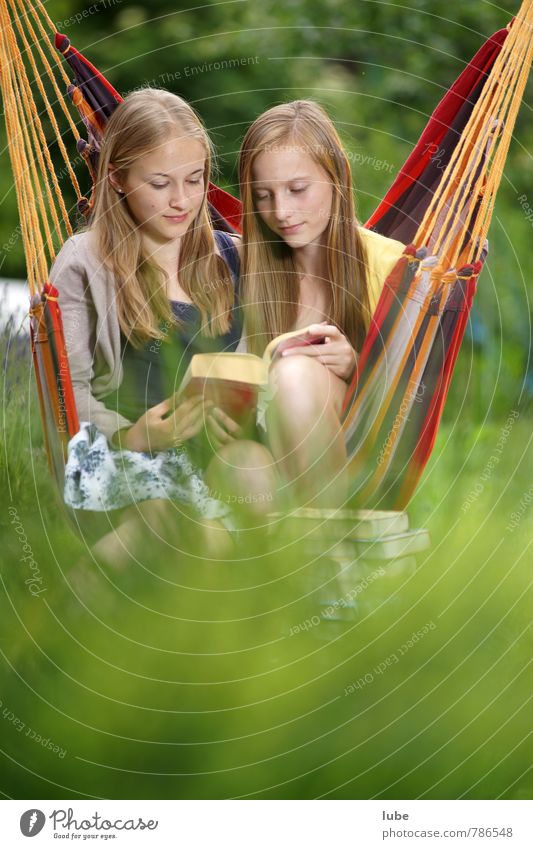 reading community Harmonious Relaxation Human being Feminine Girl Youth (Young adults) 2 13 - 18 years Child Book Reading Long-haired Beautiful Cuddly Happy