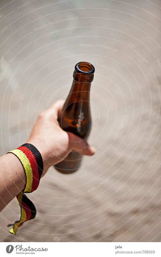 yeah world champion! Beverage Drinking Alcoholic drinks Beer Bottle Feminine Hand To hold on Fluid Fresh Delicious German Flag Colour photo Exterior shot