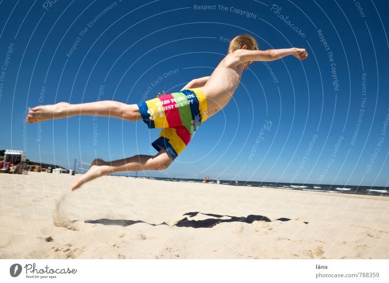 Jump for joy Joy Beach Success Boy (child) 1 Human being 8 - 13 years Child Infancy Sky Cloudless sky Summer coast Baltic Sea Swimming trunks Movement Flying