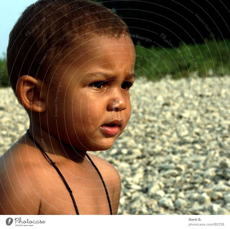 earnestness Nursery school child Earnest Sunlight Child Boy (child) Skin color Beautiful Brown Small Black Africans Toddler Concern Looking Facial expression