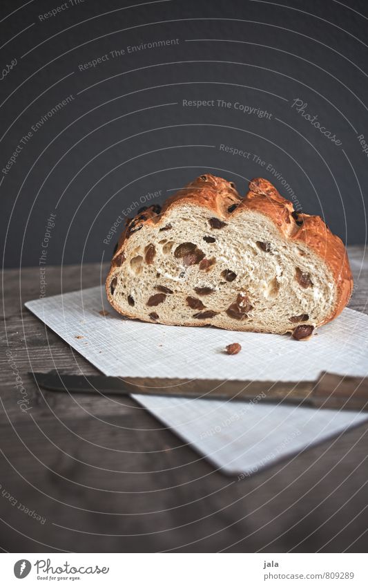 mares with raisins Food Dough Baked goods Cake Nutrition Breakfast To have a coffee Vegetarian diet Knives Chopping board Fresh Delicious Natural Colour photo