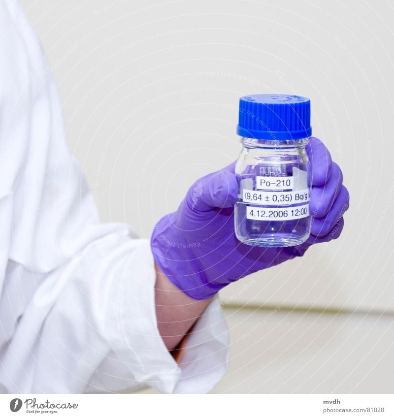 Polonium has struck Laboratory Radioactivity Laboratory assistant Chemist Informer Gloves Smock Radiation White Illuminating Agent Obscure poisoning