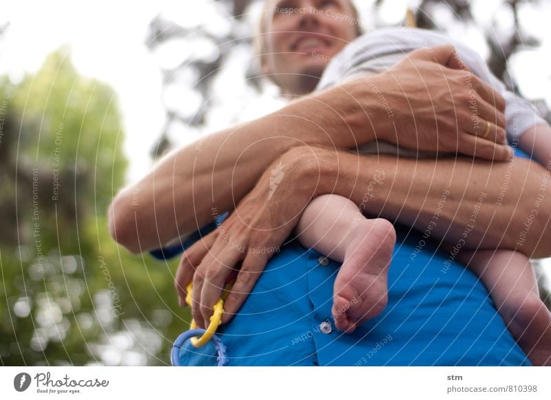 Father proudly carries his baby Leisure and hobbies Garden Human being Masculine Child Baby Man Adults Parents Family & Relations Infancy Life 2 0 - 12 months