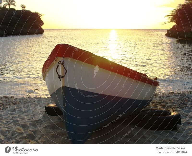 Fishing boat in the sand on the beach Sand Water Sunrise Sunset Summer Beach Ocean Boating trip Relaxation Calm Colour photo Copy Space top Evening