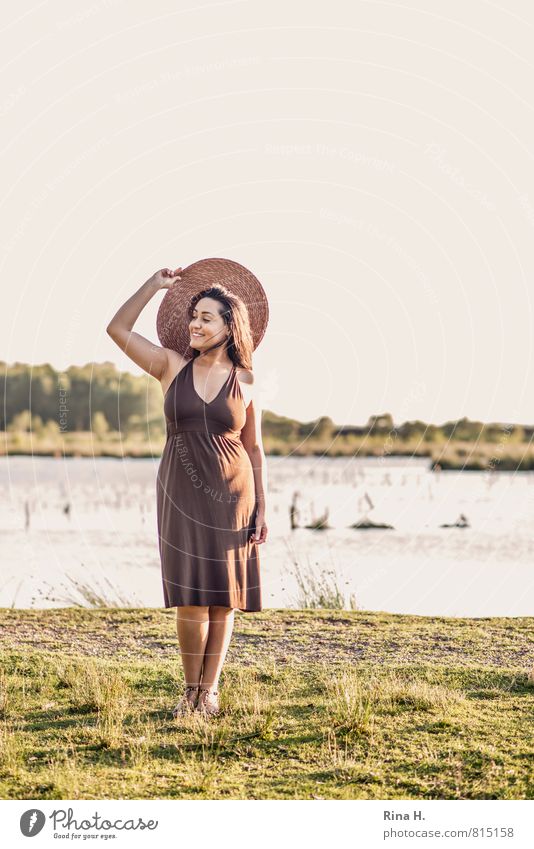 At the lake Woman Adults 1 Human being 30 - 45 years Environment Nature Landscape Beautiful weather Grass Lake Dress Footwear Hat Black-haired Long-haired