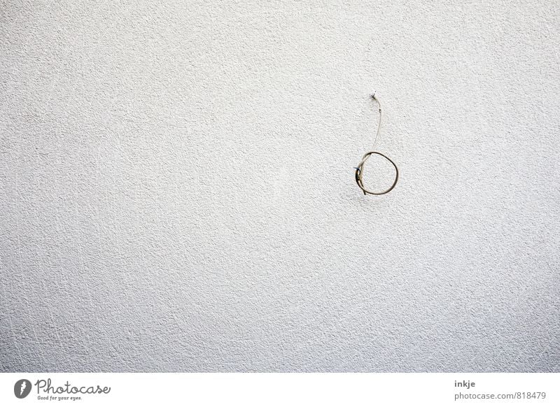 closing time Work and employment Construction site Closing time Deserted Wall (barrier) Wall (building) Facade Cable Knot Bow Circle Hang Thin Simple Bright