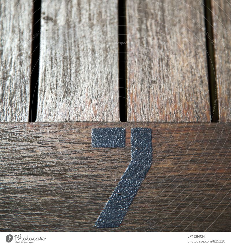 dwarves Wood Sign Digits and numbers Value Tabletop 7 Wooden table Wood grain Colour photo Exterior shot Close-up Detail Deserted Copy Space top Day