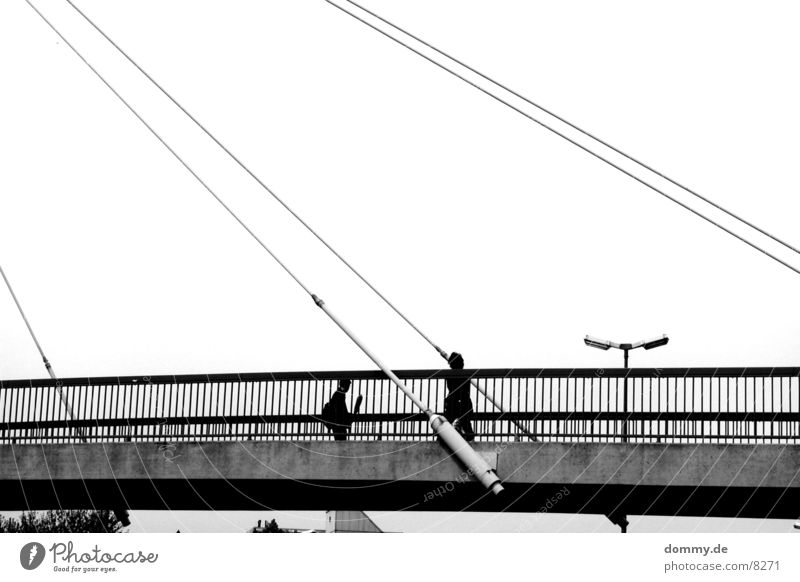 suspension bridge Black Dark Encounter Bridge Human being Black & white photo wise Day Old