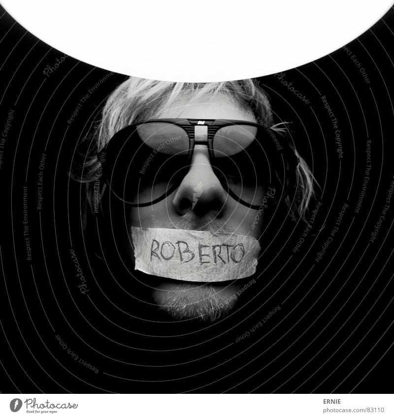 Robööörto Light Eyeglasses Blonde Facial hair Typography Man 1 Characters Sunglasses Black & white photo 1 Person Individual Only one man One young adult man