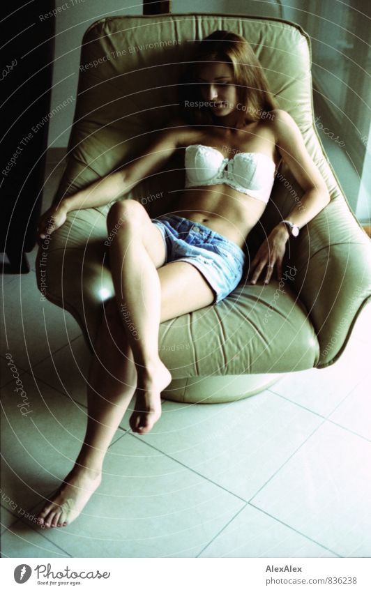 relaxed portrait with plaster Young woman Youth (Young adults) Body 18 - 30 years Adults Room Bra Hot pants Barefoot Brunette Long-haired Armchair Sit Dream