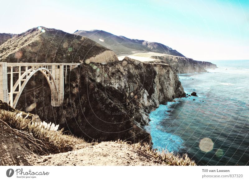 Bixby Bridge Environment Nature Landscape Elements Water Sky Cloudless sky Summer Coast Ocean Manmade structures Architecture Tourist Attraction Street Large