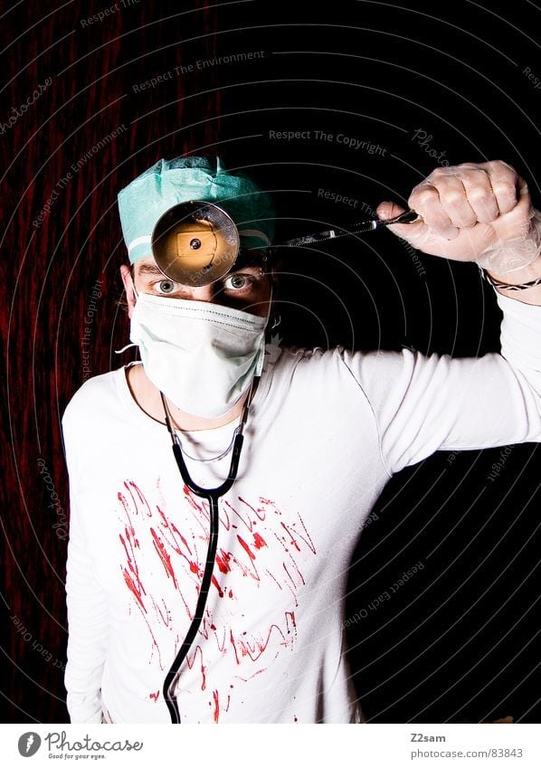 doctor "kuddl" - crazy Saw Doctor Surgeon Surgery Hospital Operation Lamp Mask Forehead Crazy Go crazy Stand Portrait photograph man gloves look eyes sick Blood