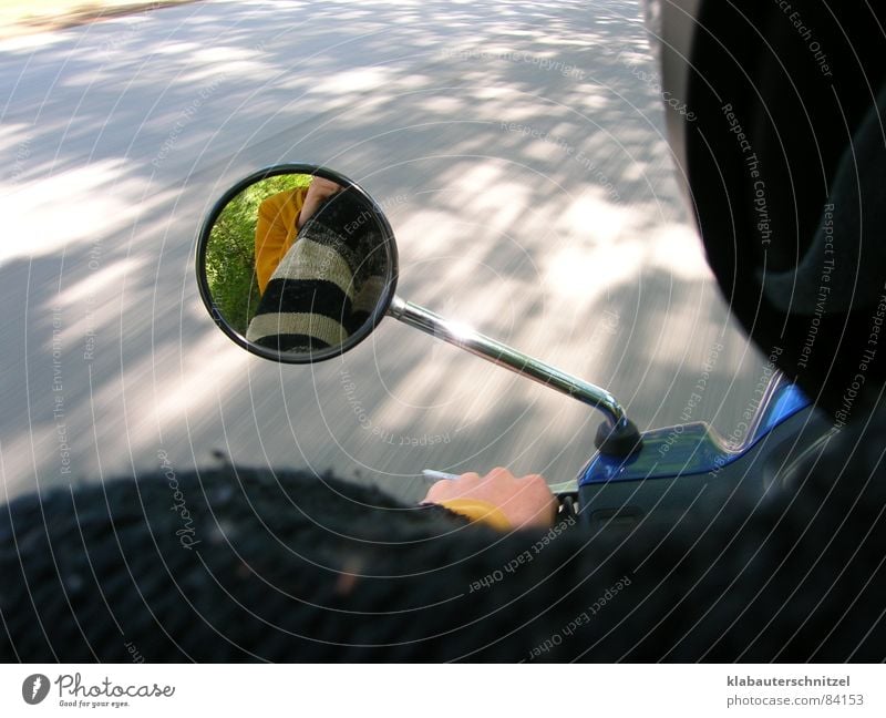The beautiful moped ride Scooter Mirror Driving Speed Reflection Autumn very fast