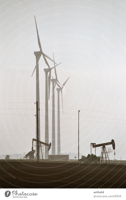 Oil versus wind power 2 Wind energy plant Oil production Oilfield Industry windmills Energy industry oil deposits Pumpjack fossil energy sources