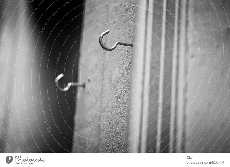 hook Wall (barrier) Wall (building) Checkmark Orderliness Arrangement Hang up Attach Practical 2 Black & white photo Exterior shot Close-up Deserted Day