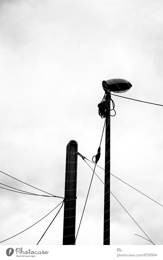 lantern, lines Sky Clouds Bad weather Street lighting Lamp post Cable Electricity Gloomy Town Boredom Line Black & white photo Exterior shot Deserted