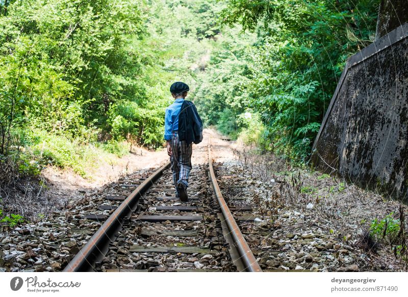 Child walking on railway Vacation & Travel Human being Boy (child) Infancy Nature Railroad Small Cute Loneliness people kid away track young Caucasian Rural