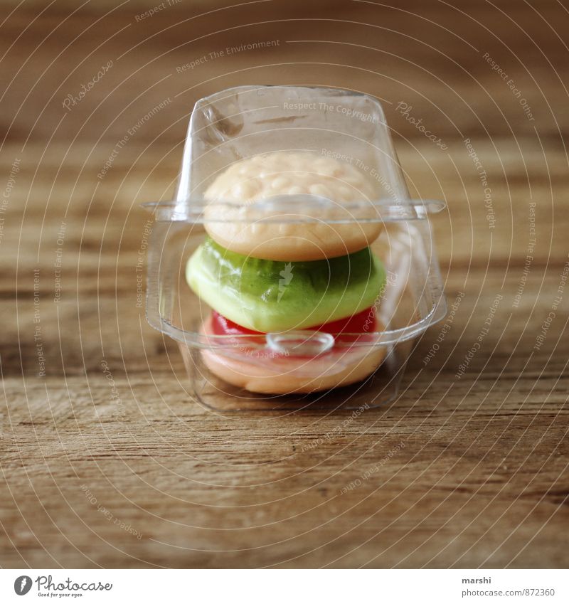 MiniSnack Food Lettuce Salad Candy Nutrition Eating Lunch Fast food Emotions Moody Hamburger Small Packaging Wooden board Meal Appetite Colour photo