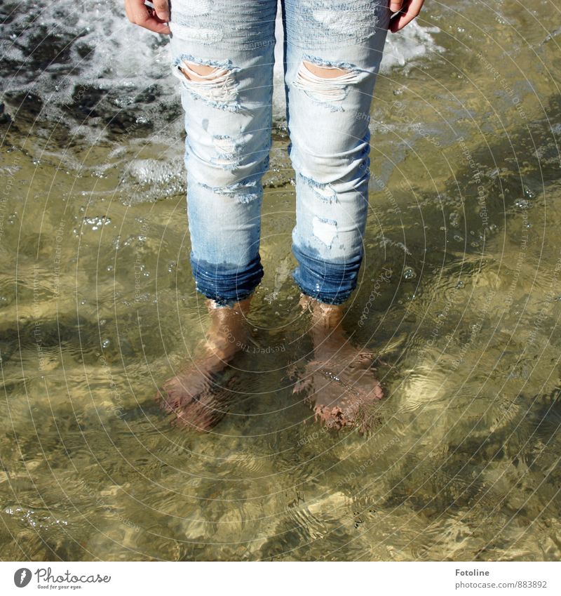 Peace for a carefree childhood. Human being Feminine Girl Infancy Fingers Legs Feet 1 Water Summer Cool (slang) Cold Wet Blue Barefoot Jeans Broken