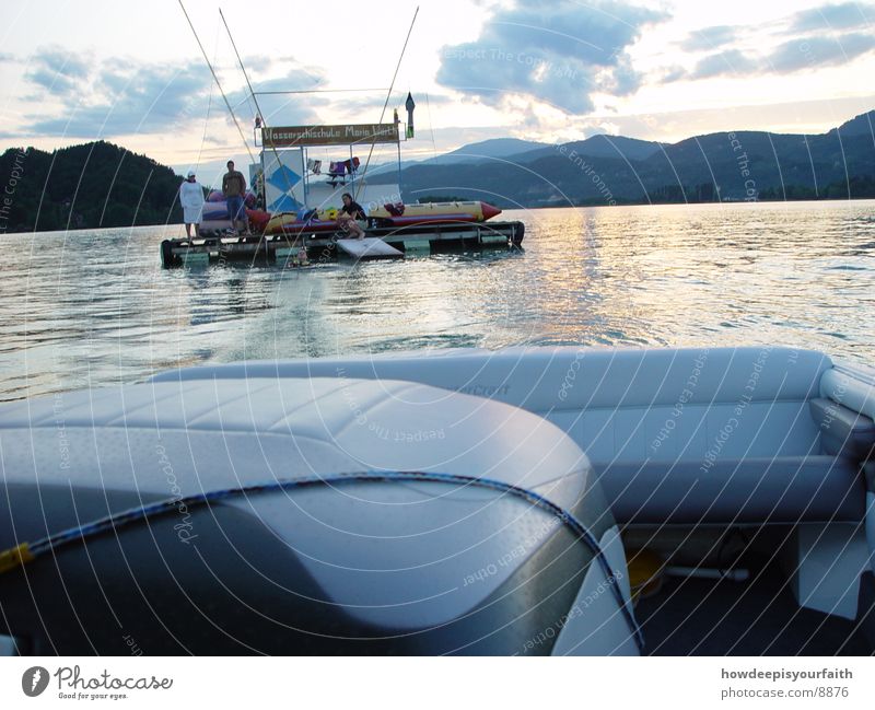 Wakeboard to the sunset Watercraft Sunset Twilight Motorboat Evening Rope Island Wakeboarding