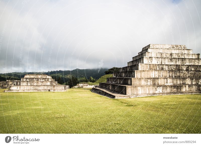 Ruinas De Zaculeu Huehuetenango Guatemala Old Maya Pyramid Temple ruins Grass surface Clouds Deserted Colour photo Exterior shot Copy Space top