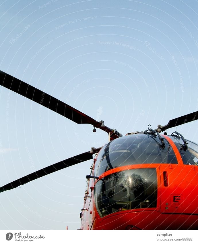 so´n flight stuff Helicopter Airplane Rescue helicopter Emergency doctor Aircraft Red Electrical equipment Technology Aviation Obscure Sky Blue Orange Rotor