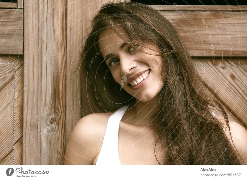 dimpled Young woman Youth (Young adults) Head Face 18 - 30 years Adults Beautiful weather Wooden door Undershirt Brunette Long-haired Smiling Laughter Esthetic