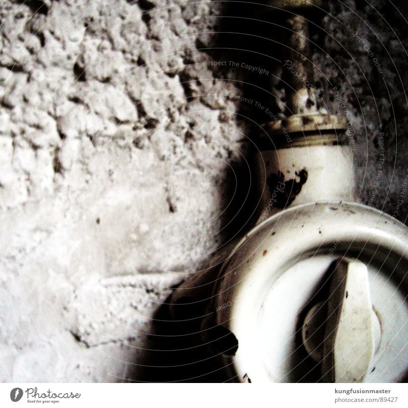 Light is still burning in the cellar Switch Light switch Rotary switch Old Bright Wall (building) White Plaster Electrical equipment Technology Stone Minerals