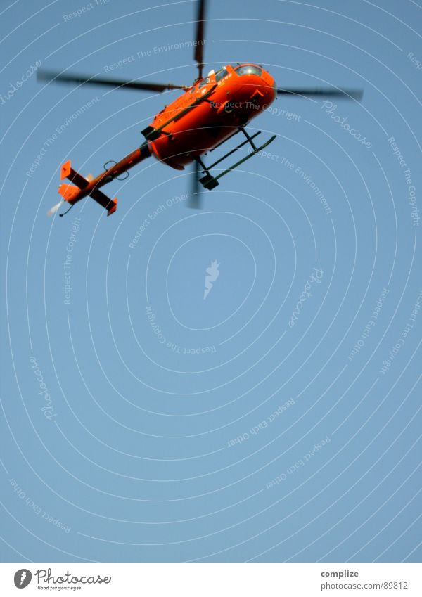 flight stuff! Helicopter Airplane Emergency doctor Doctor Rescue Lifesaving Savior Aviation Trust Orange Blue Blue sky heli Rotor crash flying doctors