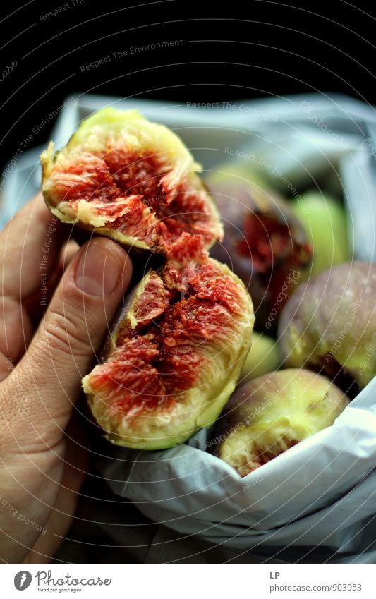 a fig in two halves Food Fruit Dessert figs Nutrition Eating Picnic Organic produce Vegetarian diet Diet Fasting Autumn To feed Simple Delicious Beautiful