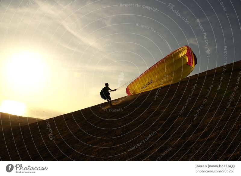 Paragliding I Evening Sunset Beginning Depart Infinity Weightlessness Hover Sports Playing Extreme sports Desert human dream Dusk