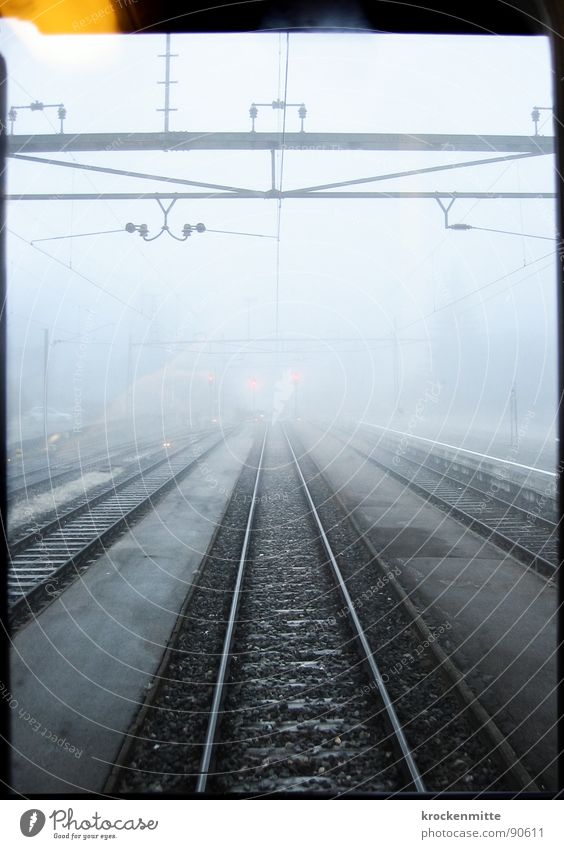 Partir, c'est mourir un peu Railroad Railroad tracks Fog Window Transport Goodbye Grief Depart Come Highway ramp (entrance) Cold Winter Electricity Morning