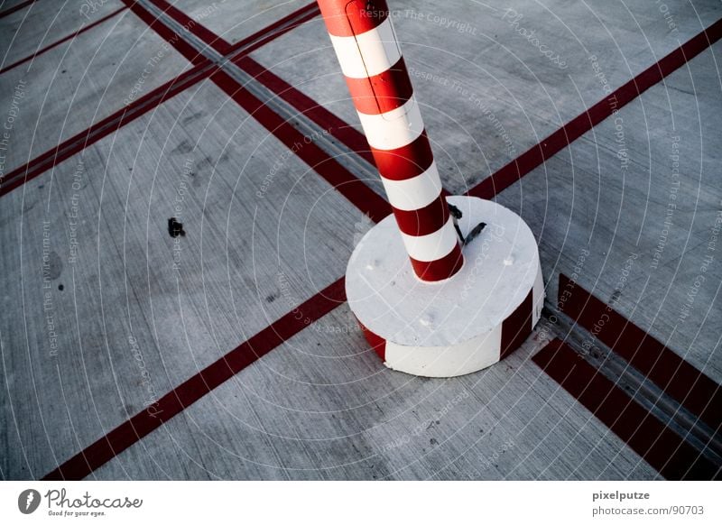 ringlet tower in the sea of lines Asphalt Parking lot Red Circle Places Variable Division Concrete Parking garage Symbols and metaphors Warning colour Line