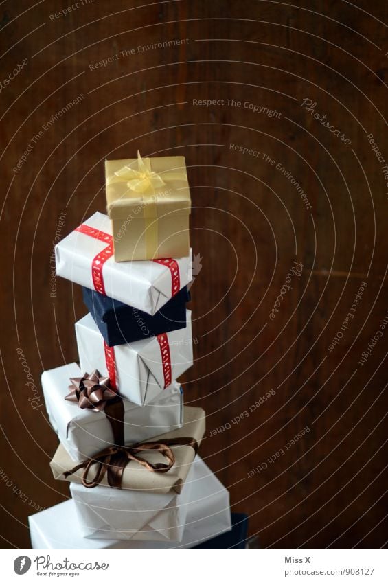Bulky Feasts & Celebrations Birthday Packaging Package Bow Tall Emotions Moody Anticipation Lack of inhibition Christmas gift Gift Stack Giving of gifts Donate