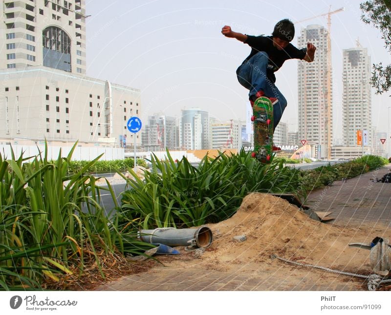 Skate Dubai Skateboarding High-rise Town Jump Funsport Media City Dubai Common Reed Sand Ollie