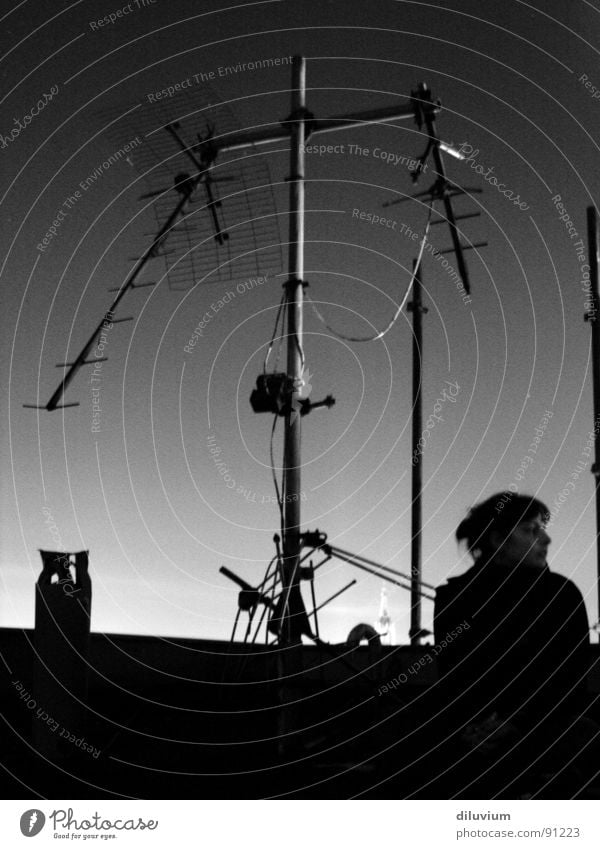 on the roofs of belins Roof Antenna Black White Dark Sky bw Bright Contrast