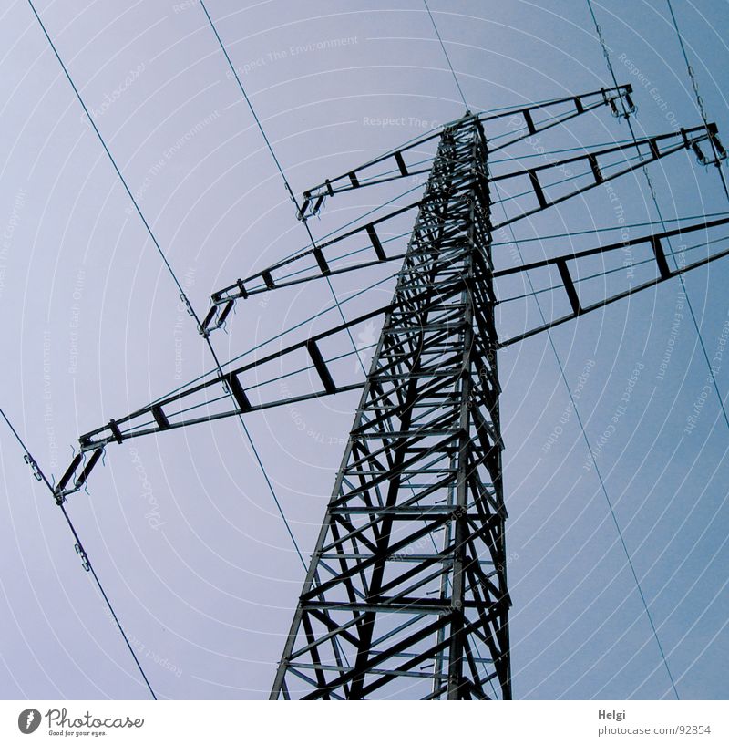 Power pole with cables from the frog's eye view in front of a blue sky Colour photo Subdued colour Exterior shot Deserted Neutral Background Day Silhouette