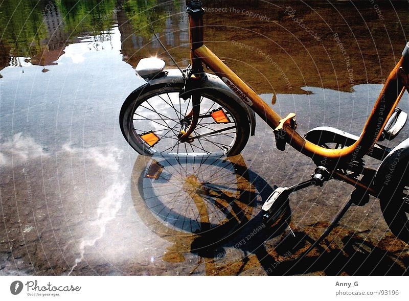 Flooding Reflection Folding bicycle Yellow Pedal Light Water Shadow Cat eyes Water reflection