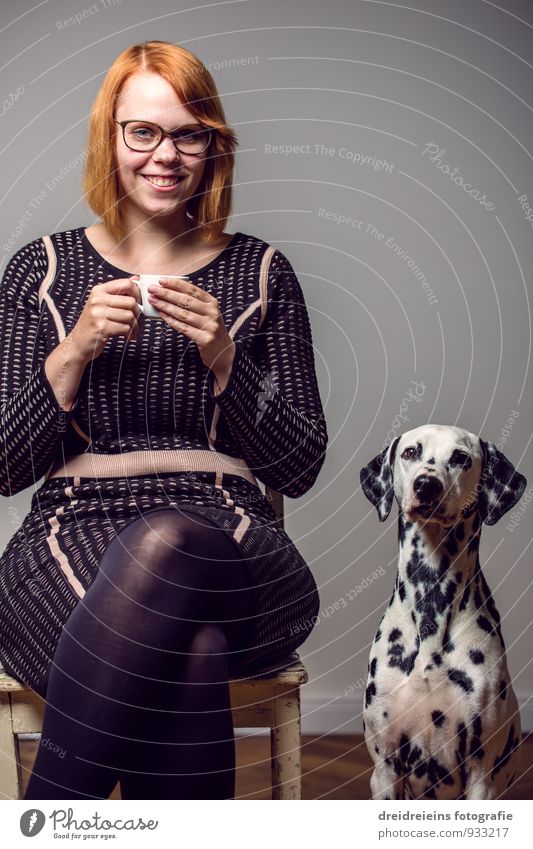 Man, dog and a cup of coffee Chair Feminine Woman Adults Tights Red-haired Animal Pet Dog Smiling Laughter Sit Drinking Wait Athletic Elegant Friendliness