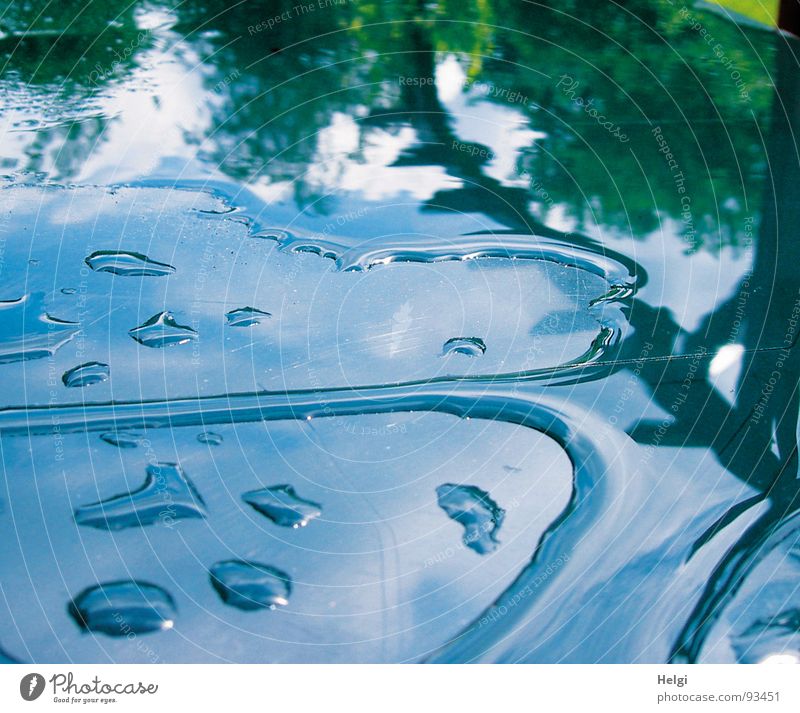 Rainwater on a blue garden table with reflection Colour photo Exterior shot Detail Deserted Reflection Garden Environment Nature Elements Water Drops of water