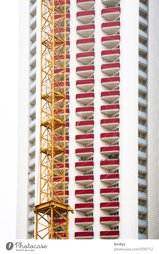 A crane grows with its tasks Construction site Crane Construction crane Leipzig High-rise Architecture Facade Balcony Esthetic Tall Modern Town