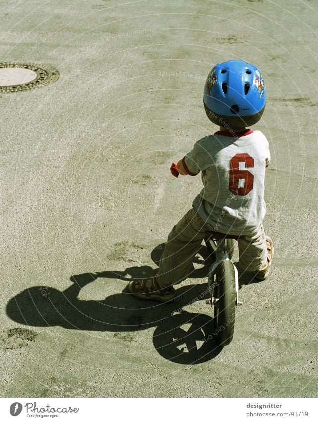 BLUE HELMET Bicycle Child Driving Helmet Resolve Boy (child) Brave Cool (slang) boy ride determinaion firmness bravery blue Kiddy bike