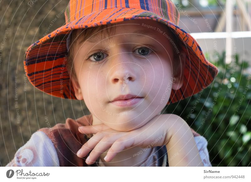 286 [a quiet day] Contentment Vacation & Travel Summer Child Boy (child) Infancy Life 1 Human being 3 - 8 years Beautiful weather Tree Bushes Garden Hat Cap