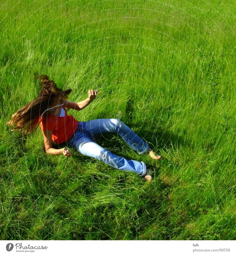 Rough landing. Hair and hairstyles Summer Youth (Young adults) Grass Meadow Movement Flying Green Joy Happy Happiness Joie de vivre (Vitality) Spring fever